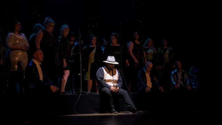 Live performance photography of musicians on stage in Washington Concert photography capturing stage lighting and live music performance Backstage rehearsal photography of performing artists Professional performance photography for theatre and touring musicians Documentary photography of artists and live entertainment